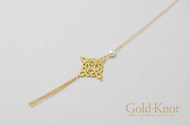 “Arabesque pendant G”　Freshwater pearls, goldleaf With fringe